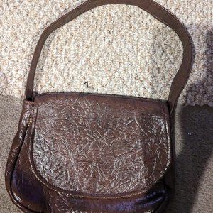 Talon vintage embossed brown leather handcrafted by HIRTZ